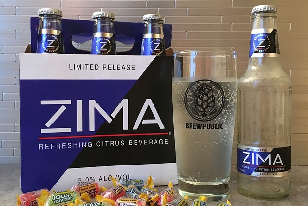 A-Brewpublic-glass-filled-with-Zima-amongst-various-flavors-of-Jolly-Rancher-candy.